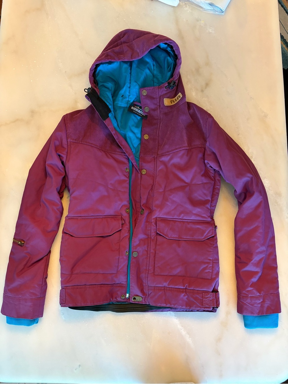 Women's Insulated Ski Jacket in Magenta with Teal Lining